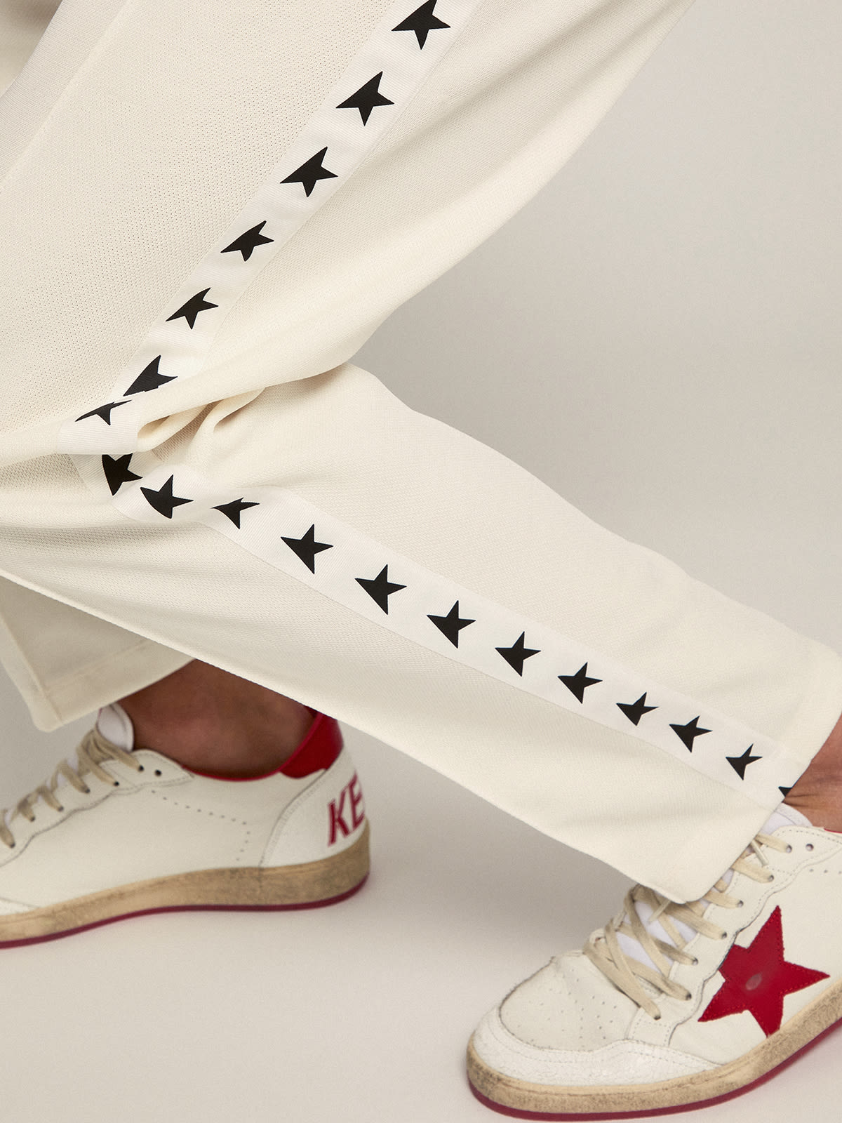Golden Goose - Men’s white joggers with black stars on the sides in 